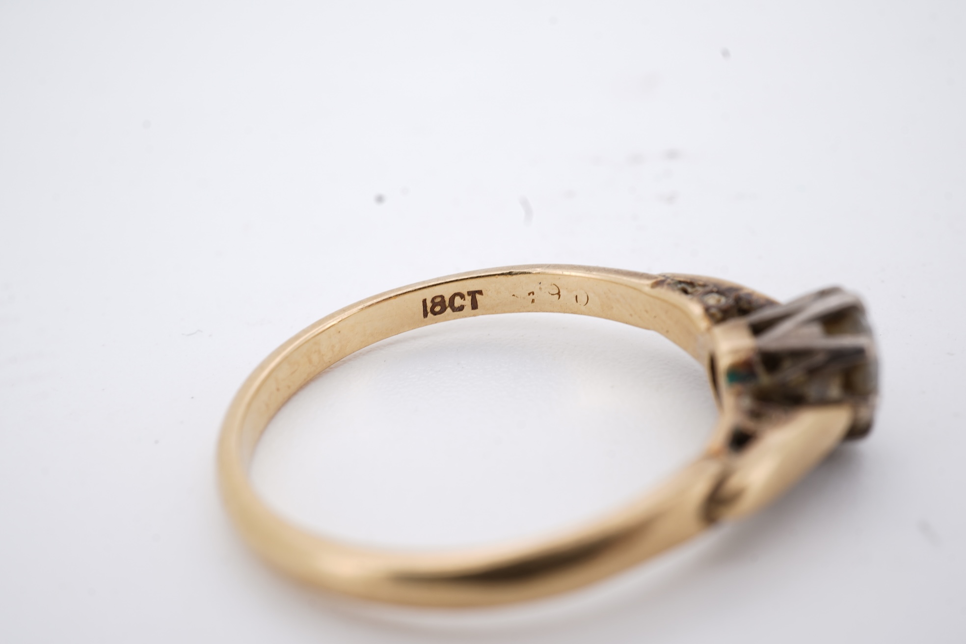 An 18ct and solitaire diamond set ring, the stone weighing approximately 0.30ct, size N, gross weight 2.8 grams.